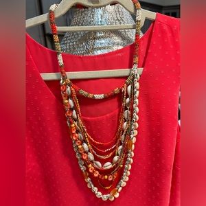 18” adjustable coral beaded and shell necklace
